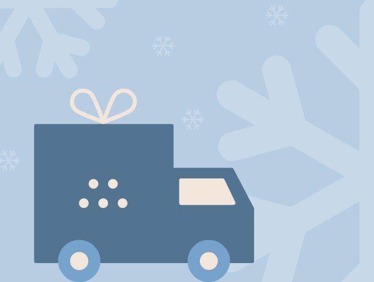 An illustrated truck decorated with a bow and Misen logo, implying shipped holiday gifts.