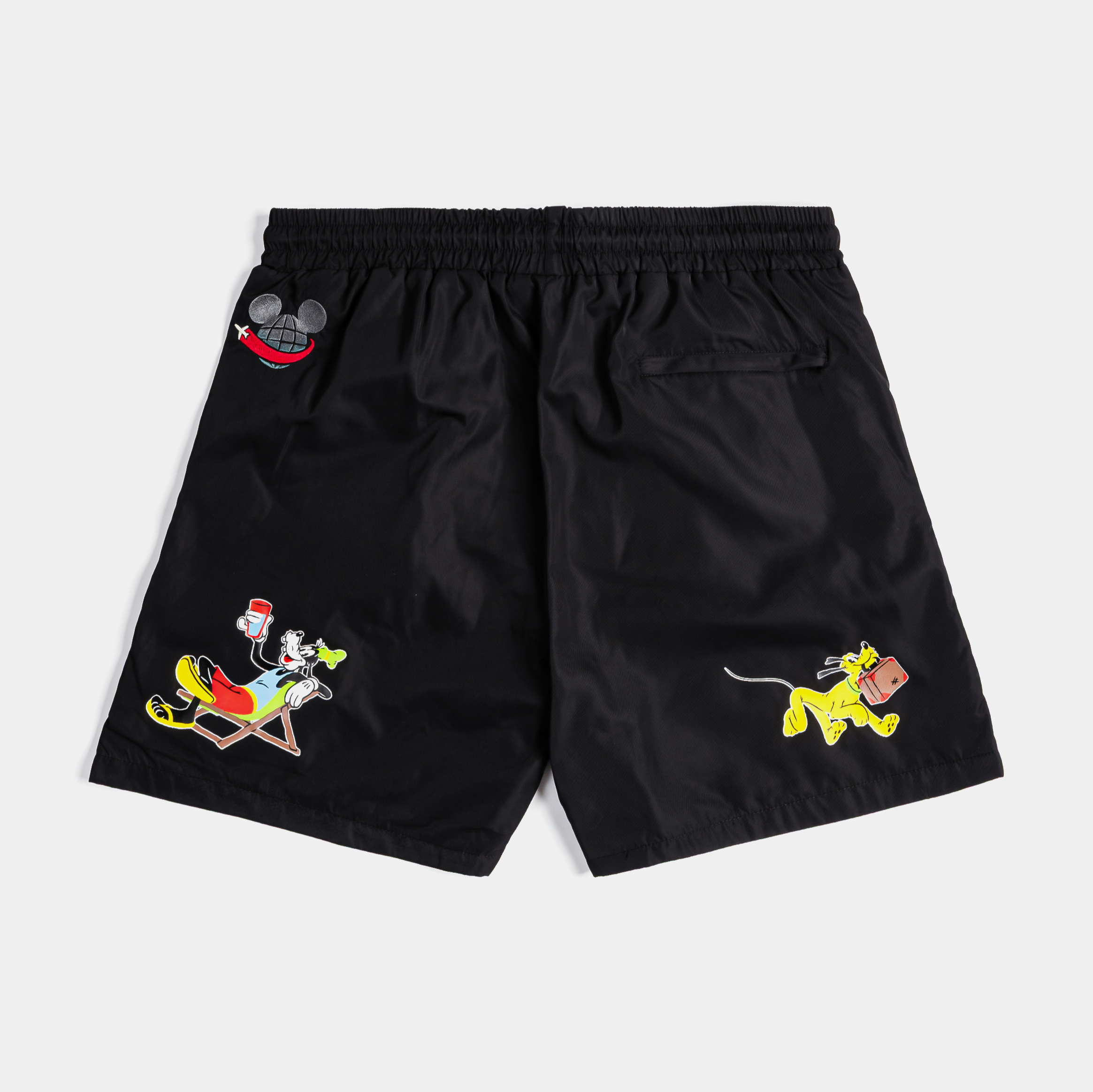 Black shorts featuring Donald Duck and Mickey Mouse designs.