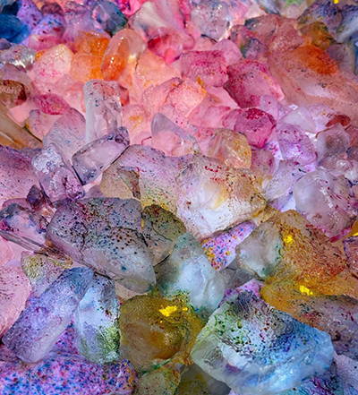 image of ice dyeing process: ice with dye sprinkled on top