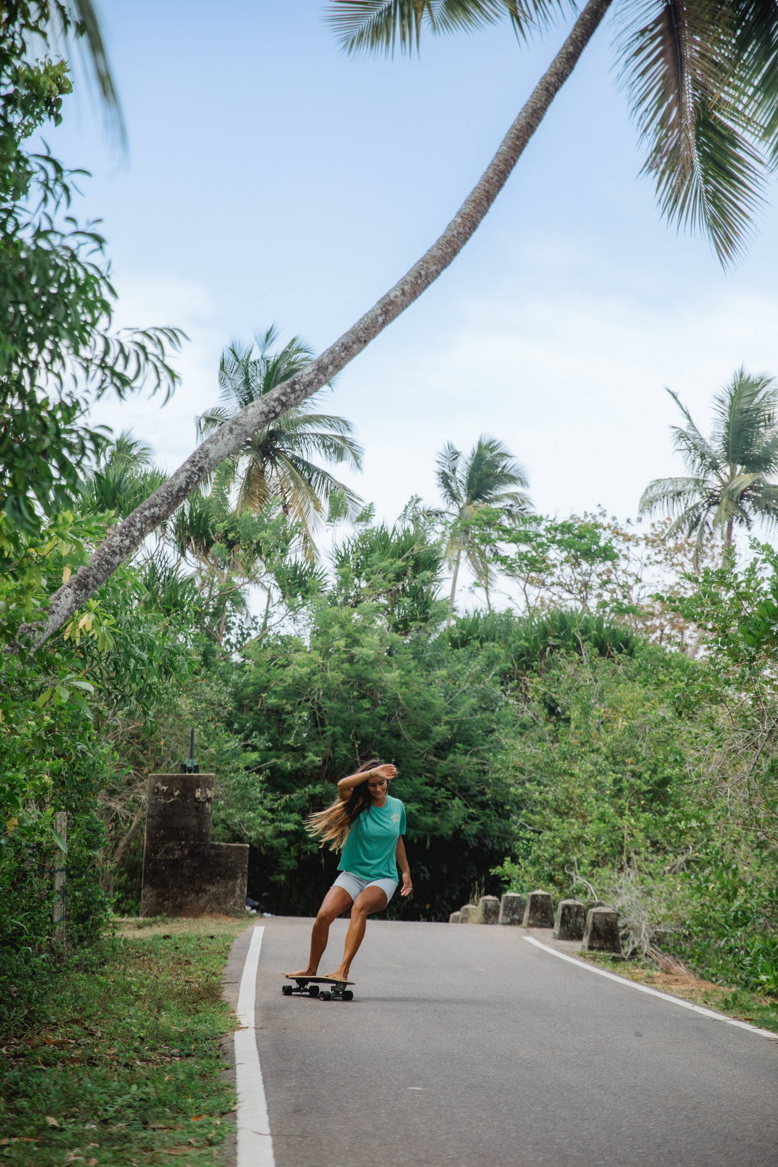 A woman skateboarding in Sri Lanka