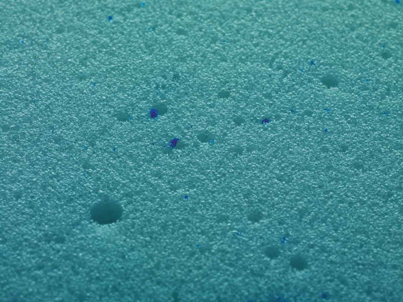 Close-up of memory foam comfort layers in a hybrid mattress where heat can become trapped without cooling technology