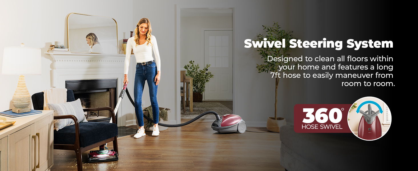 Woman using a vacuum cleaner with a swivel steering system in a room.