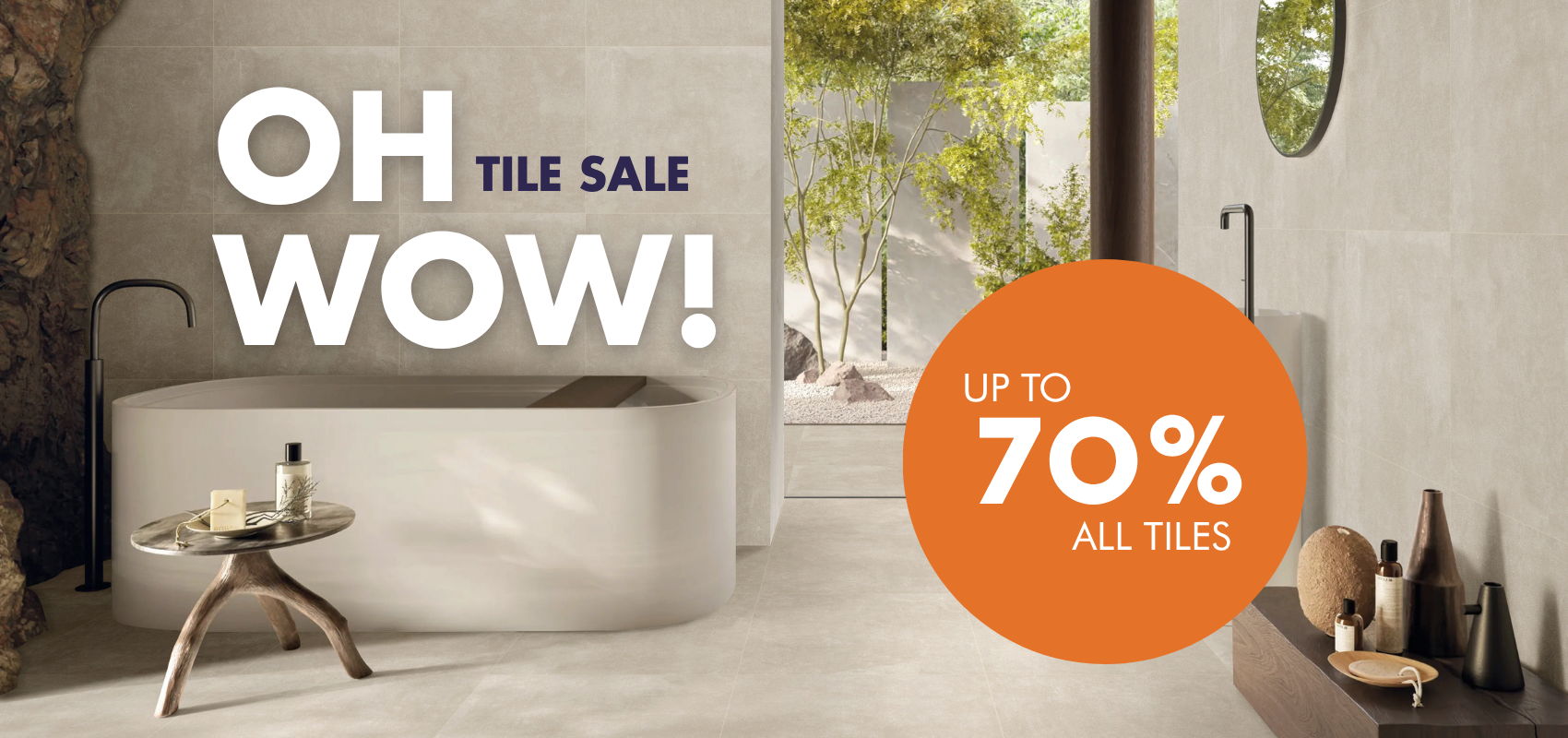 Bathroom with a tile sale announcement, highlighting up to 70% off all tiles.