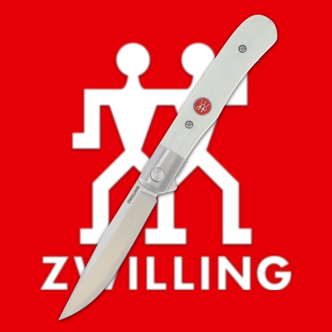 Knife over red background with Zwilling logo and two stylized figures.