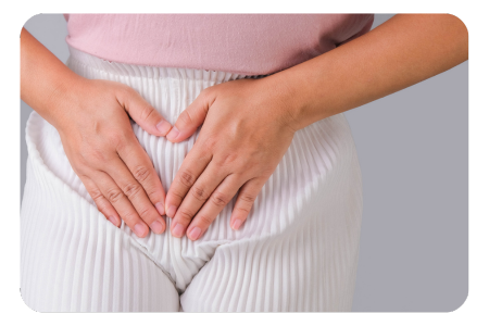 Symptoms of vaginal dryness, woman holding her pelvis 