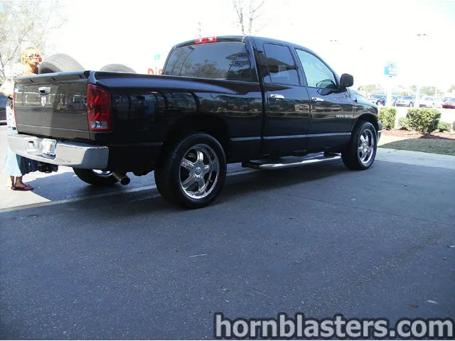 Front-side view of Jon's 2006 Dodge Ram 1500 train horn installation
