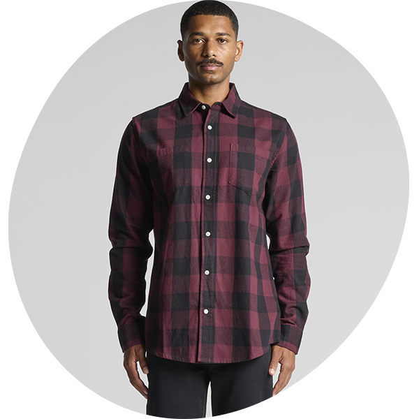 Model wearing a burgundy and black check flannel shirt