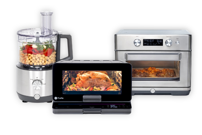 Three kitchen appliances: a food processor, a microwave, and an oven.