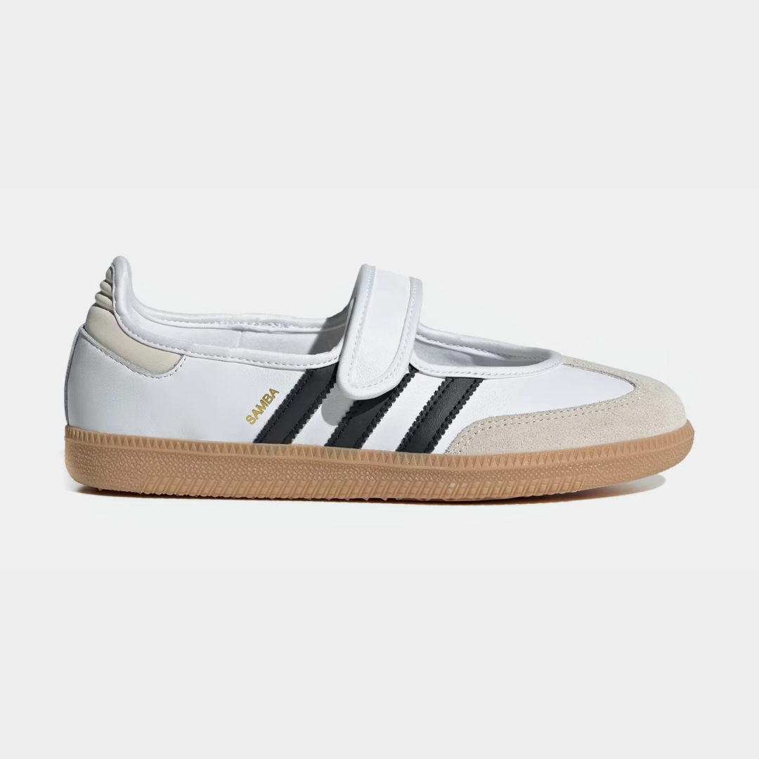 White athletic shoe with black stripes and a Velcro strap.