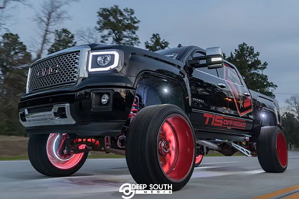 Train horn bells and mounting detail on Justin's 2014 GMC Sierra 1500 photo 3