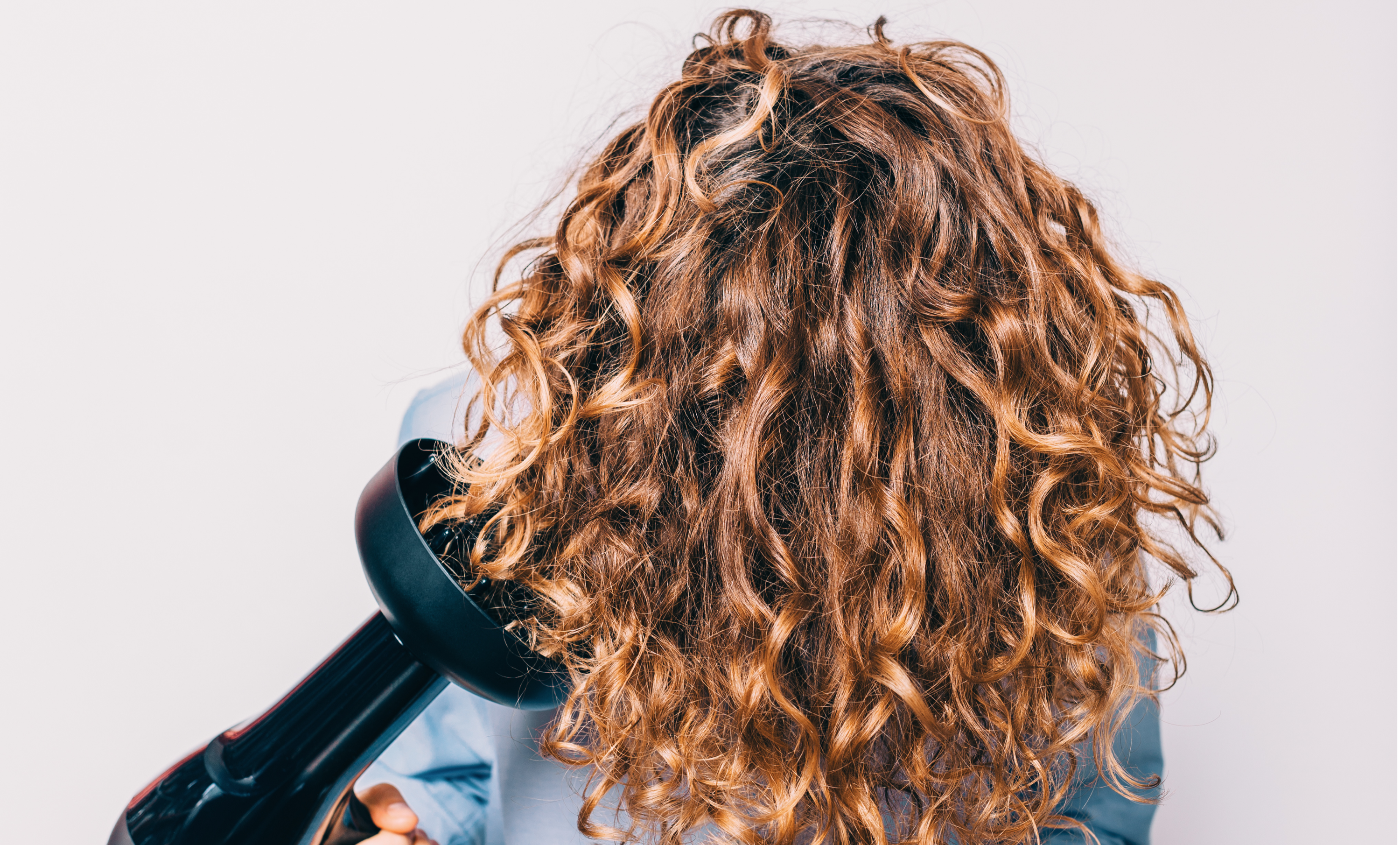 The Curly Hair Debate Air Drying Vs Diffusing Lus Brands