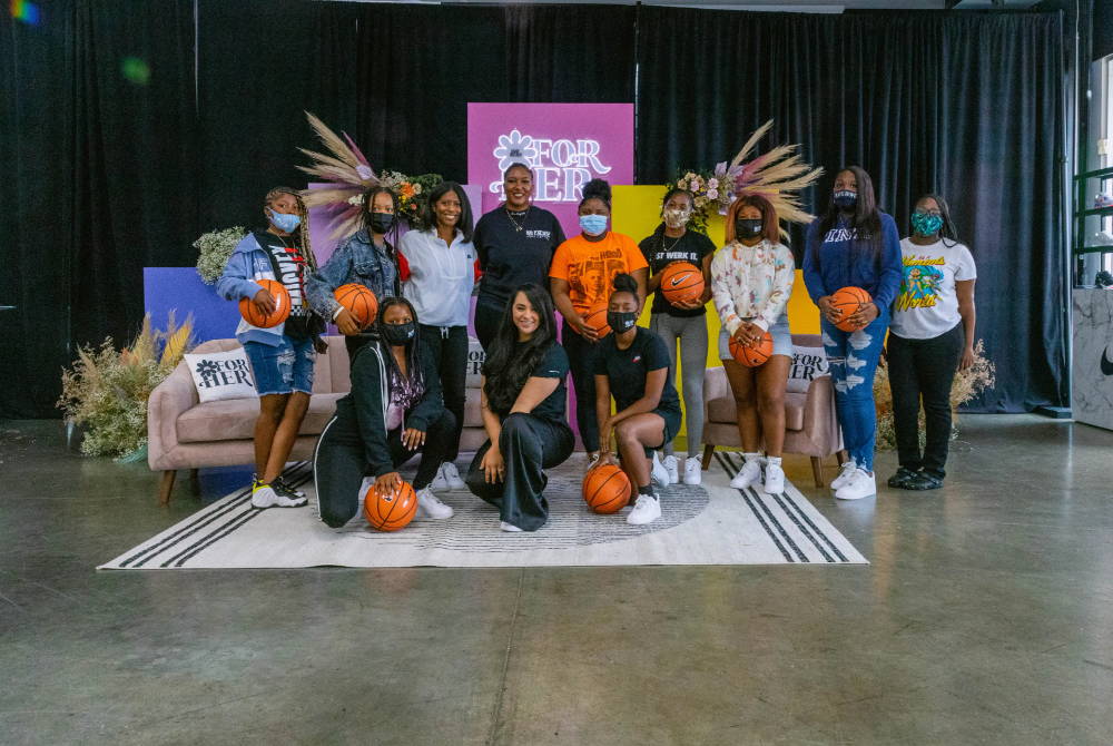 group photo with basketballs at for her event