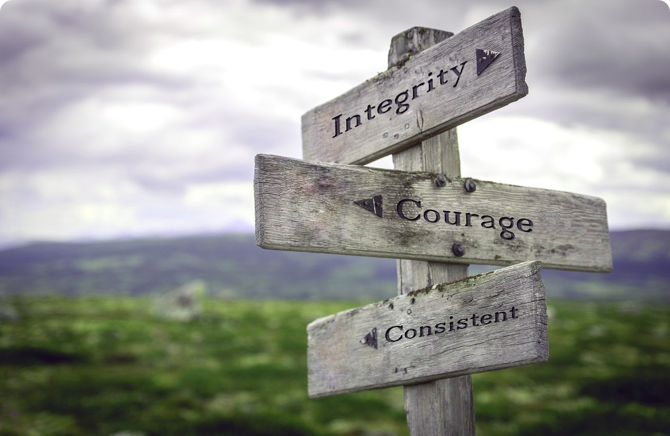 Picket fence with directions to integrity, courage and consistent