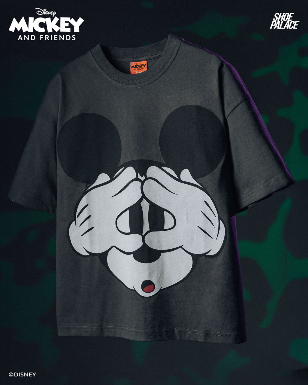 Graphic t-shirt featuring Mickey Mouse with hands over his face.