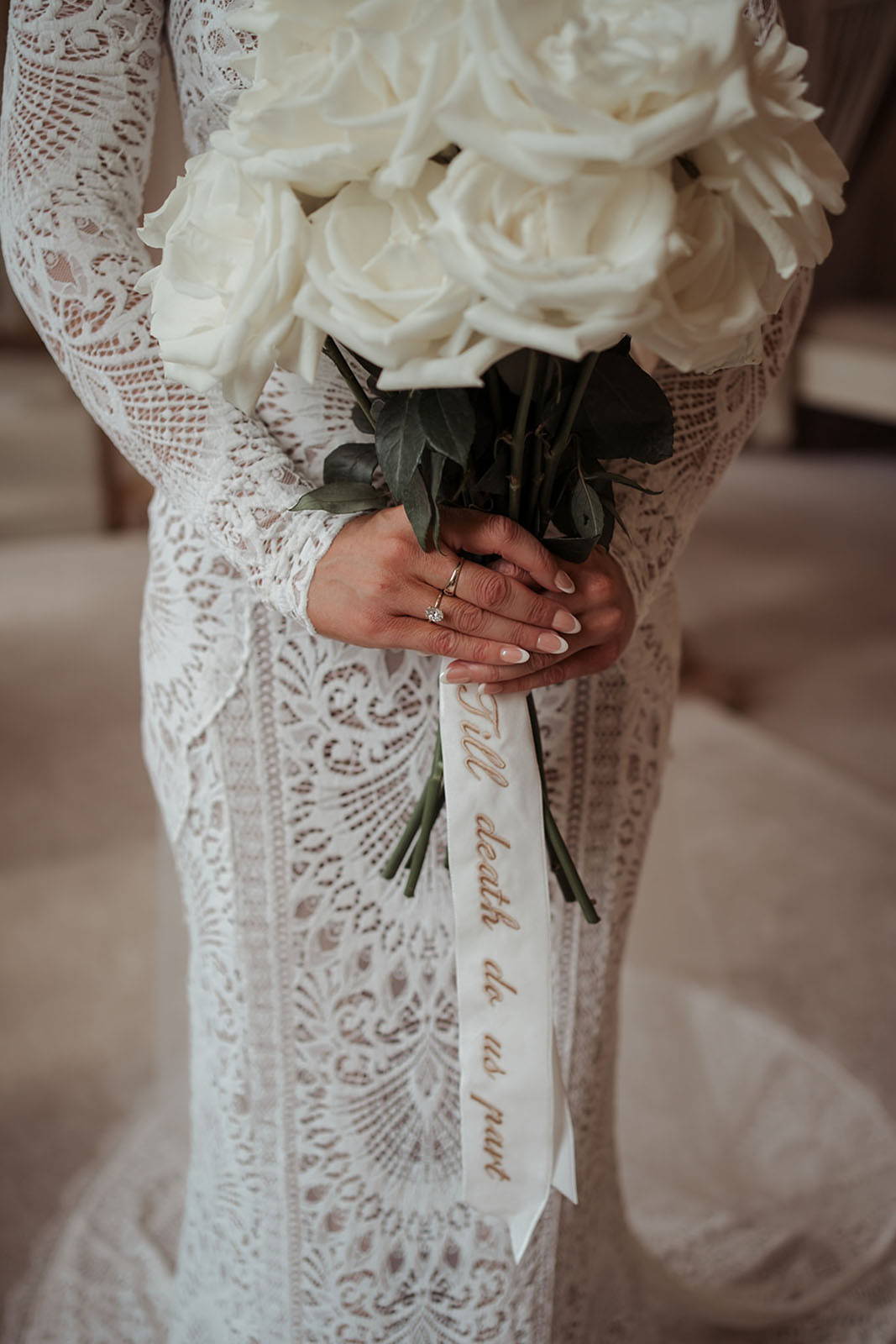 bride wearing a long sleeves wedding gown