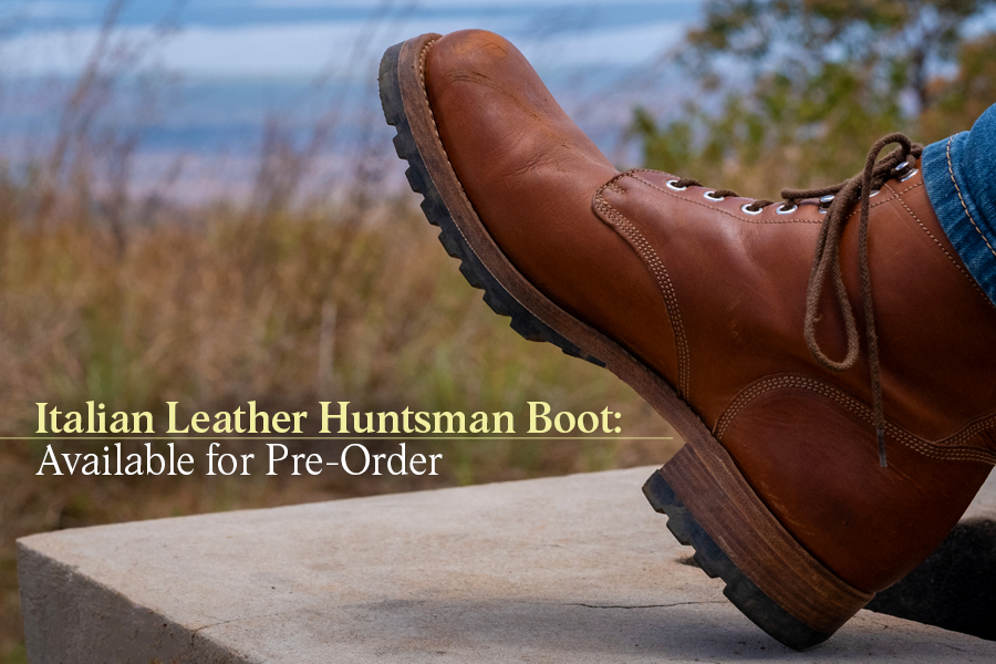 Brown Italian leather boot on a stone surface, with nature in the background.