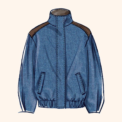 Blue denim jacket with brown shoulder patches and elastic cuffs.