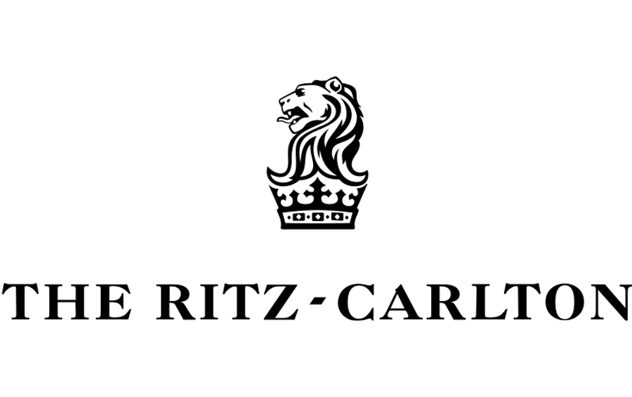 Logo of The Ritz-Carlton featuring a lion emblem and elegant text.