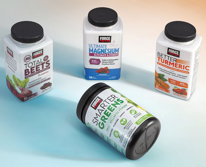 Four supplement bottles arranged artistically on a light background.