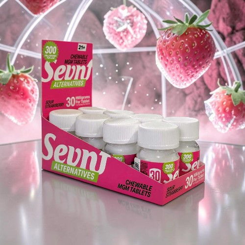 Packaging of Sevn Alternatives dietary supplement with strawberries in the background.