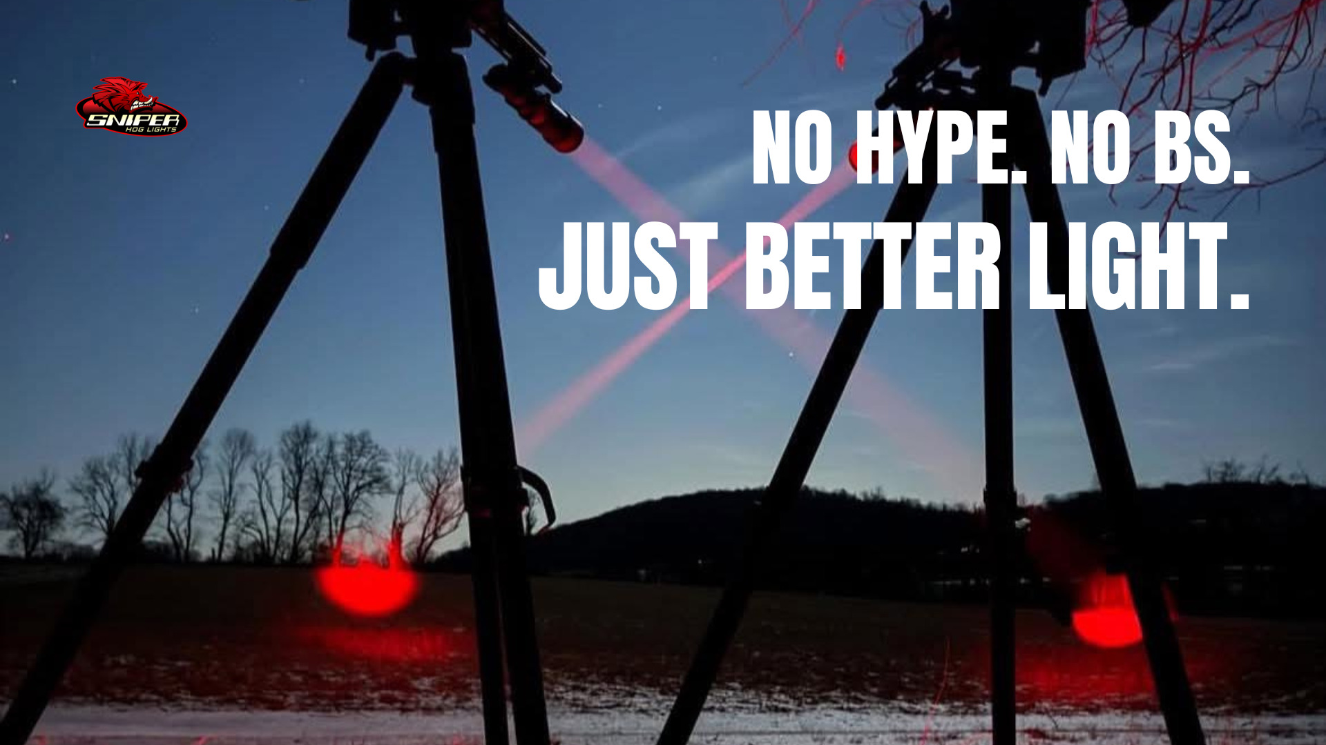 Sniper Hog Lights red hunting lights illuminating a field at night