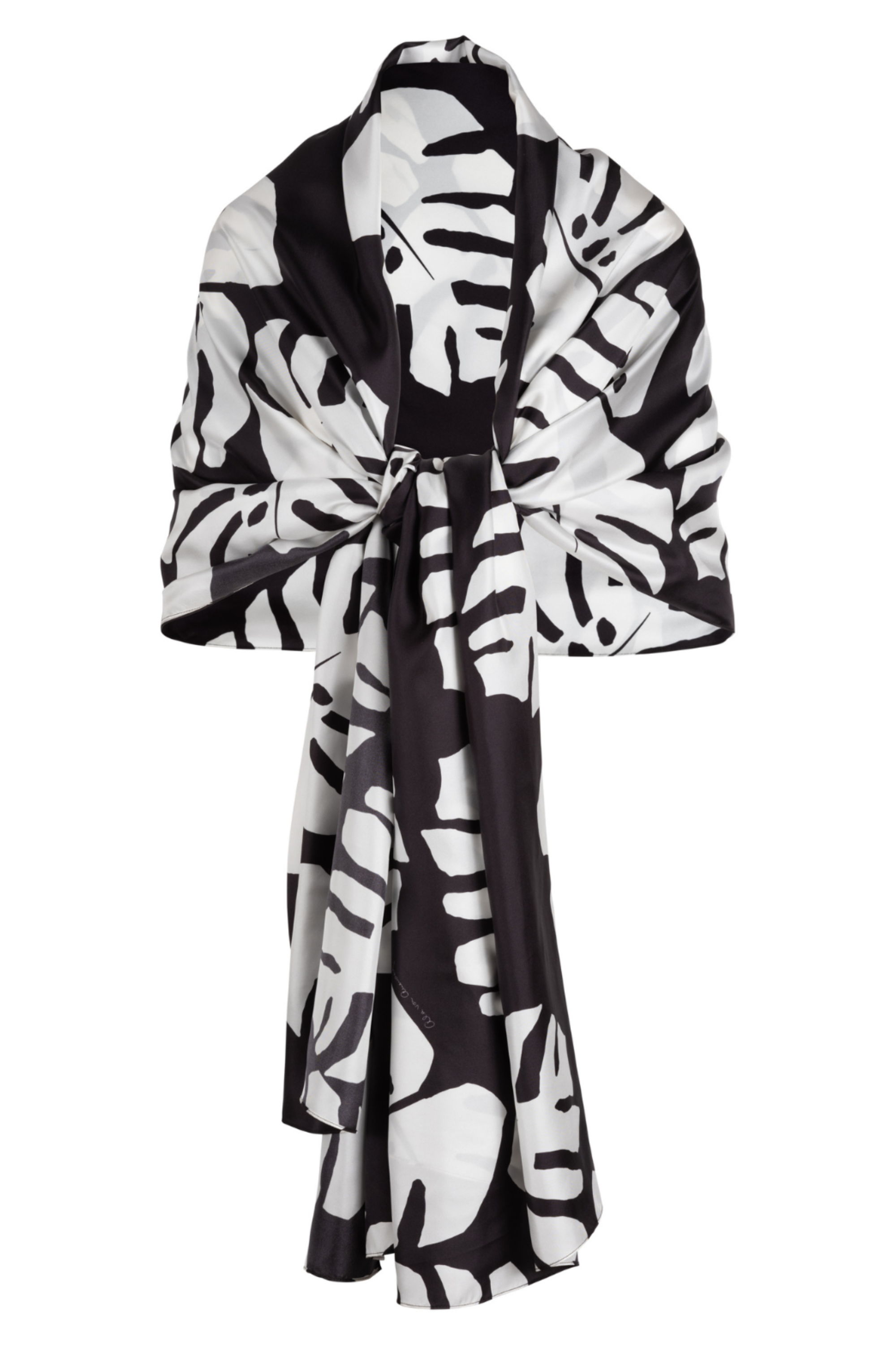 A black and white patterned scarf draped elegantly.