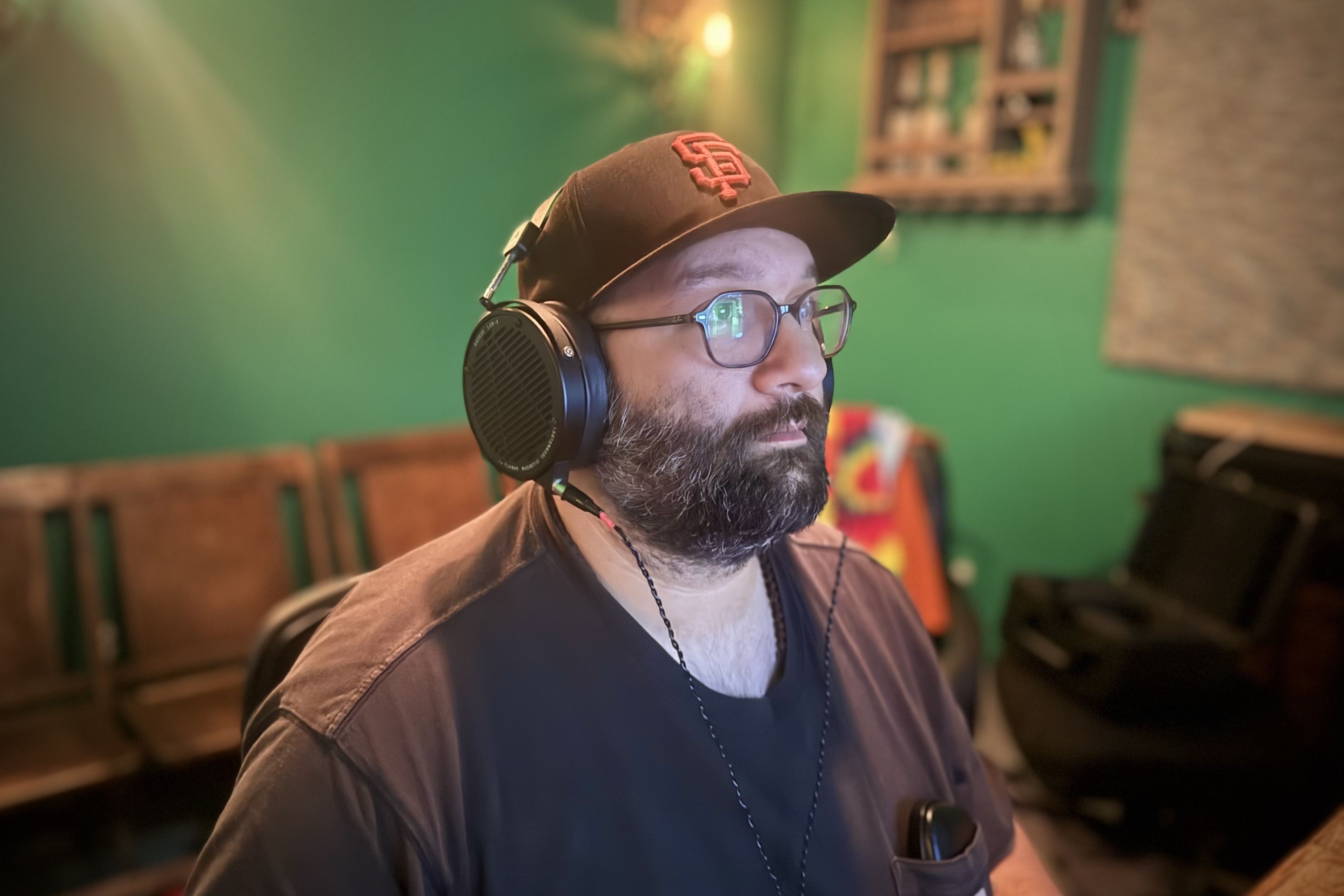 Deer Tick wearing Audeze LCD-X headphones 