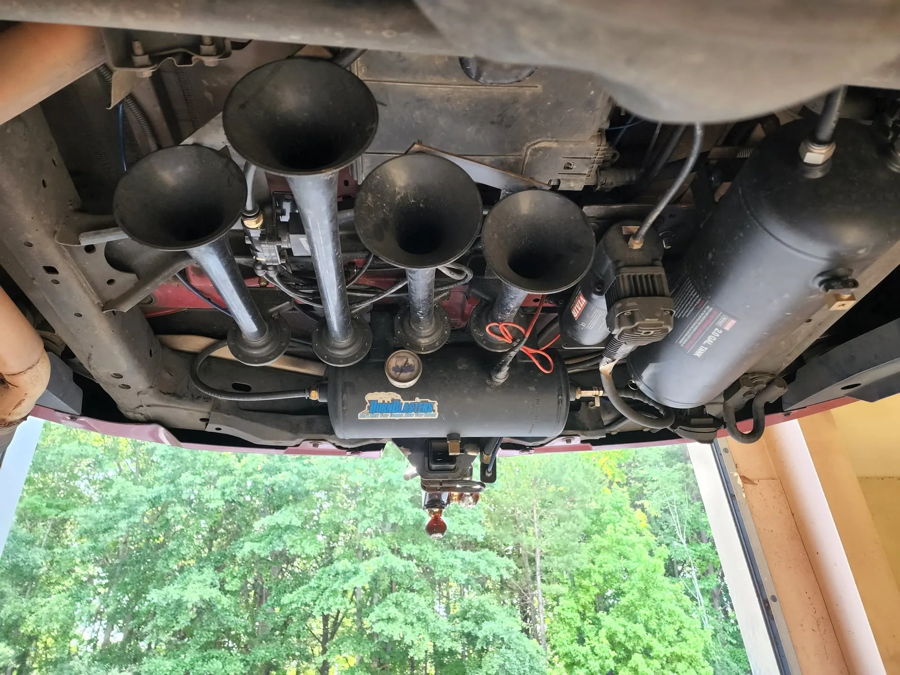 Four black horn trumpets HornBlasters Viair 2-gallon tank compressor rear undercarriage Daniel's Toyota 4Runner 544 Nightmare Edition gallery photo 3