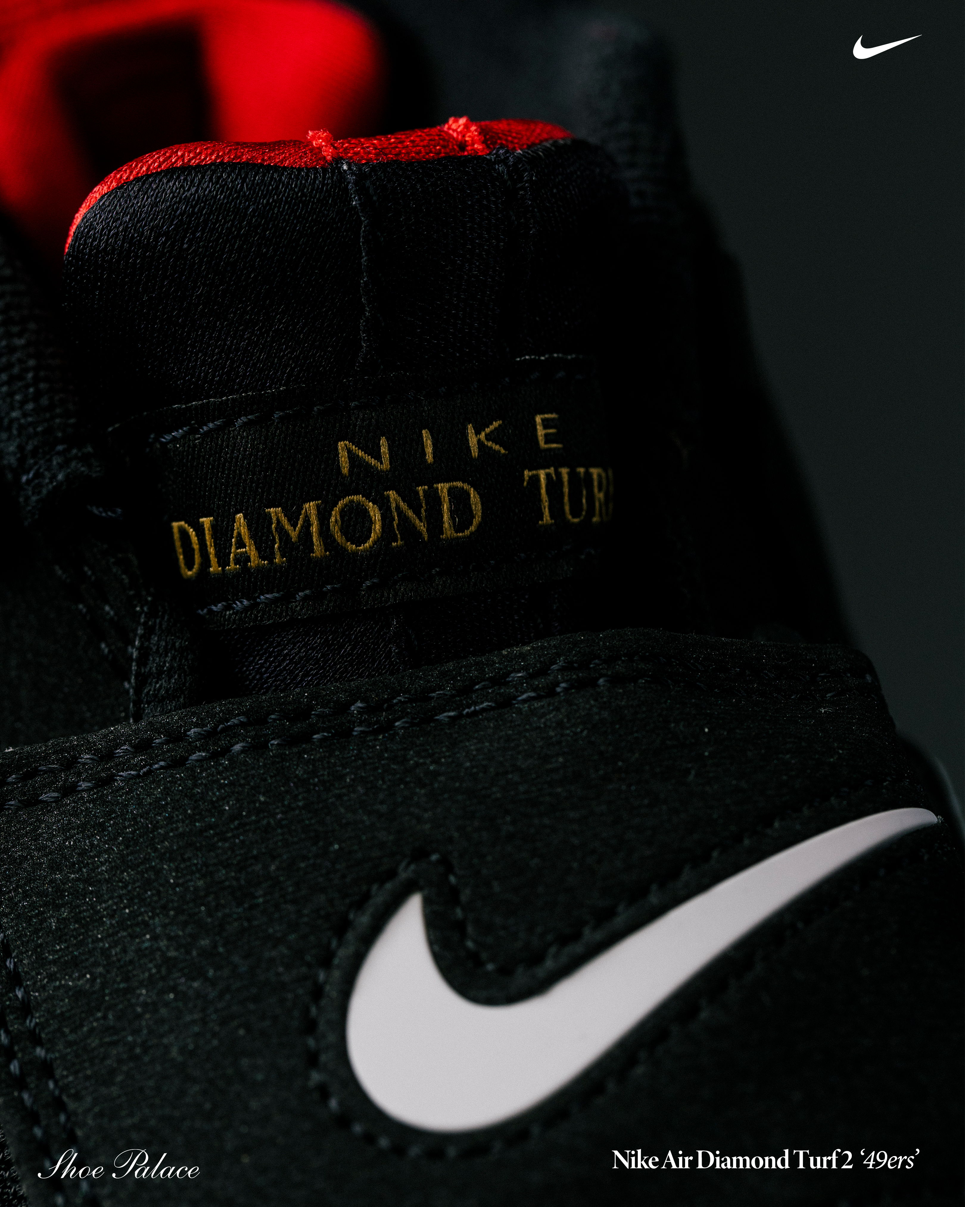 Nike Air Diamond Turf sneaker close-up with logo.