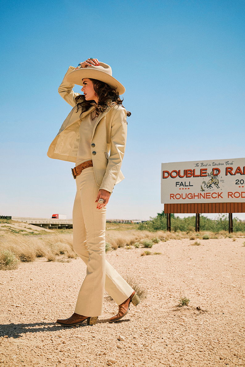 Kaylin wearing the Bandit Blazer and Pant with the Cassie Tee and vintage Double D Ranch accessories and jewelry.