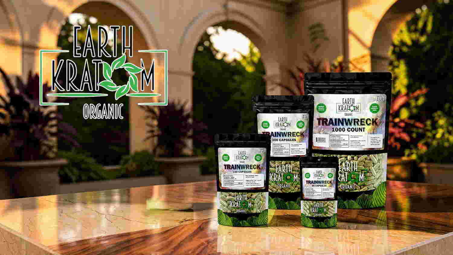 Bags of organic products displayed outdoors with greenery in the background.
