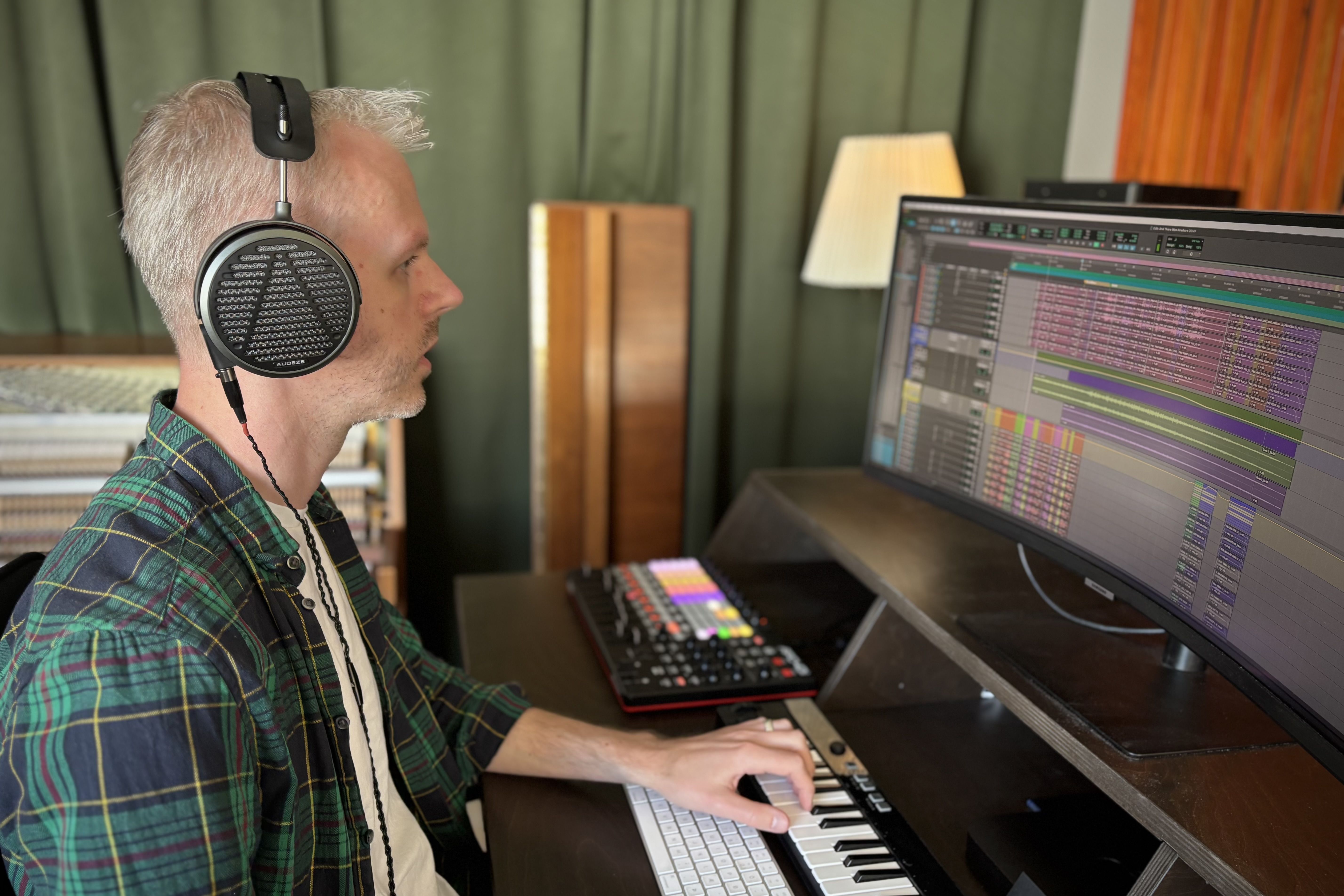 Snorri Hallgrimsson wearing Audeze MM-500 headphones in the studio