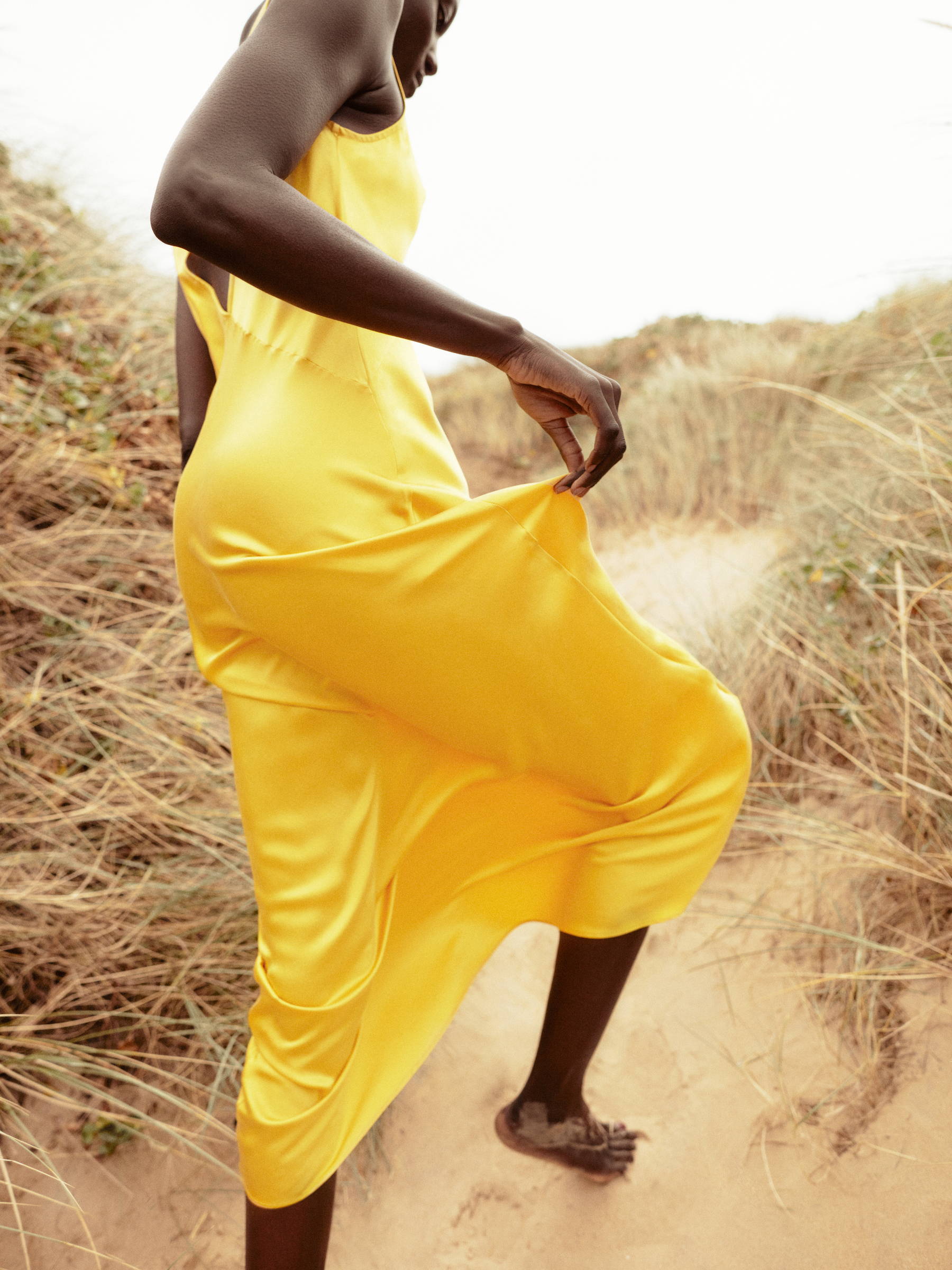 Yellow bias cut silk slip dress