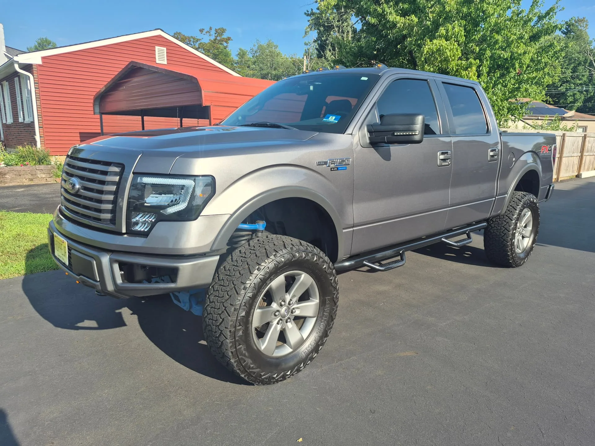 Steve's 2012 Ford F150 with Flatlaw Train Horn Kit install exterior photo 1