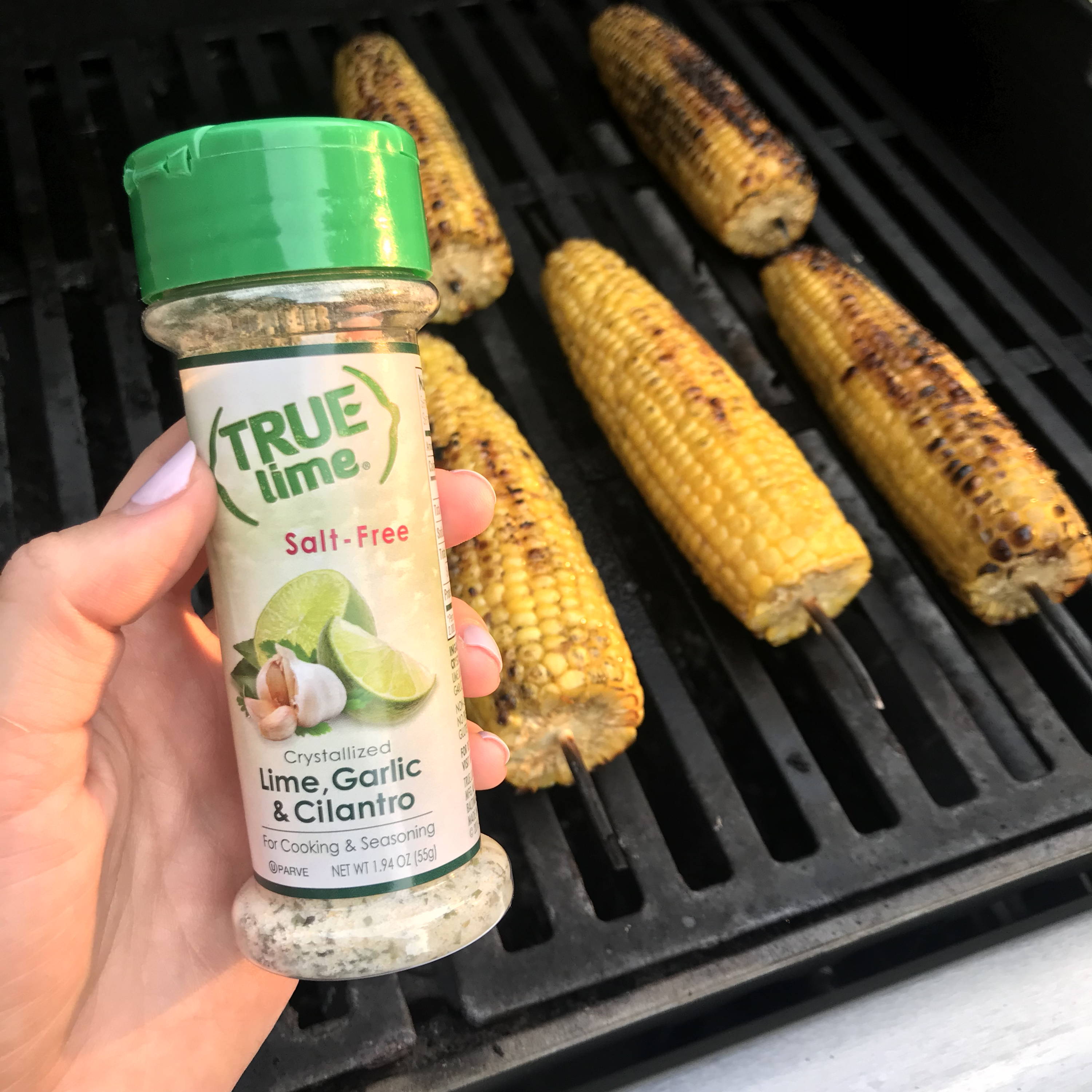 True Lime seasoning next to grilled corn