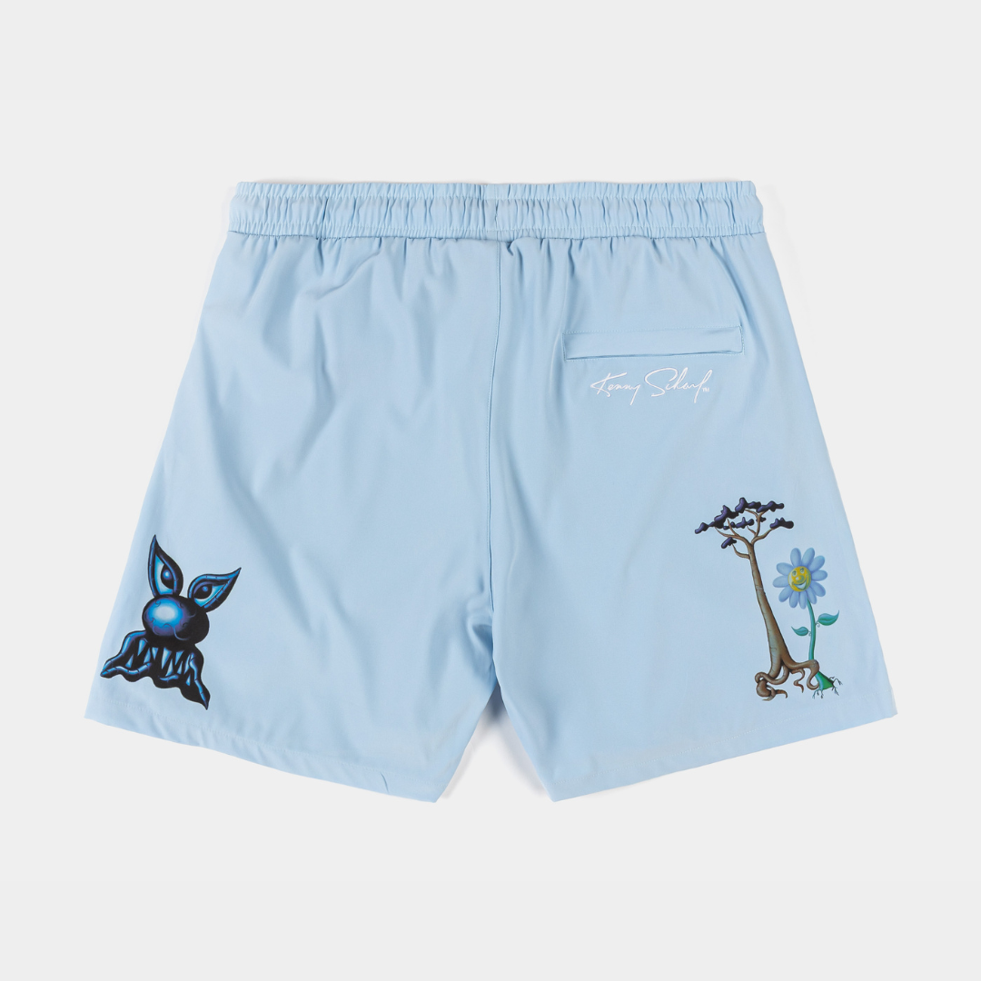 Light blue swim shorts with embroidered designs and pockets.