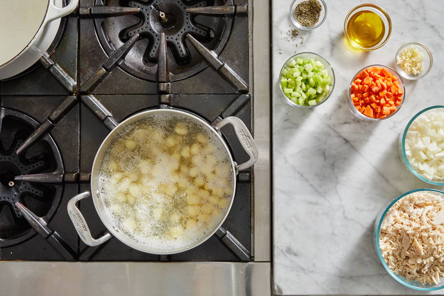 Gnocchi cooking in boiling water