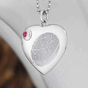 sterling silver heart urn pendant engraved with a fingerprint
