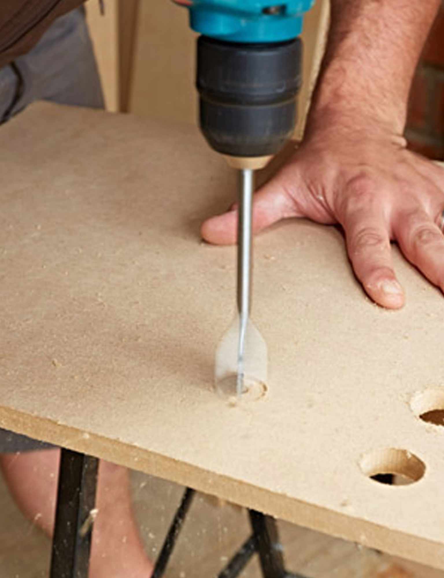 Drilling hole into piece of wood