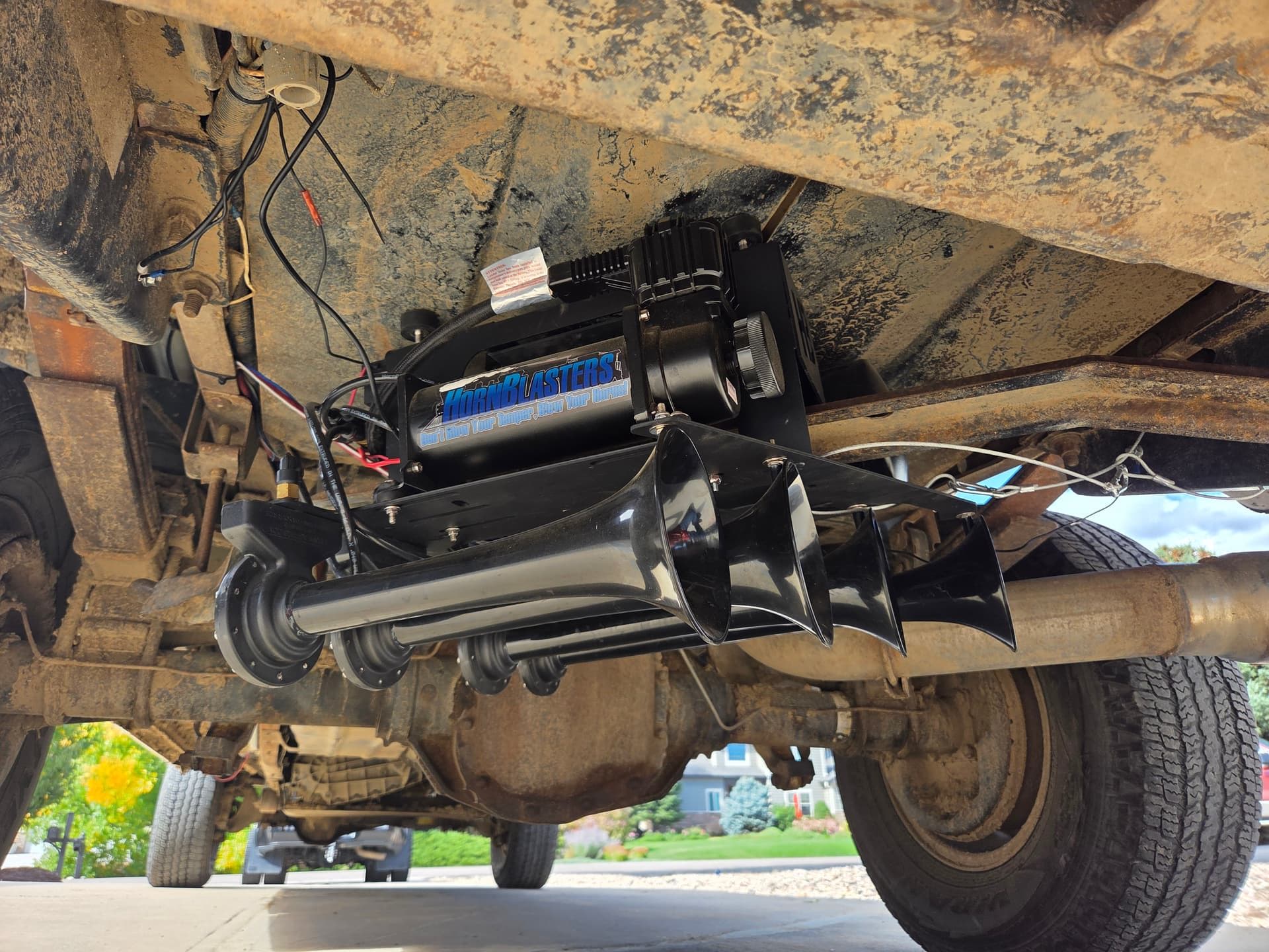 1997 Ford F250 with HornBlasters Conductor’s Special 244K Spare Tire Delete Kit installed