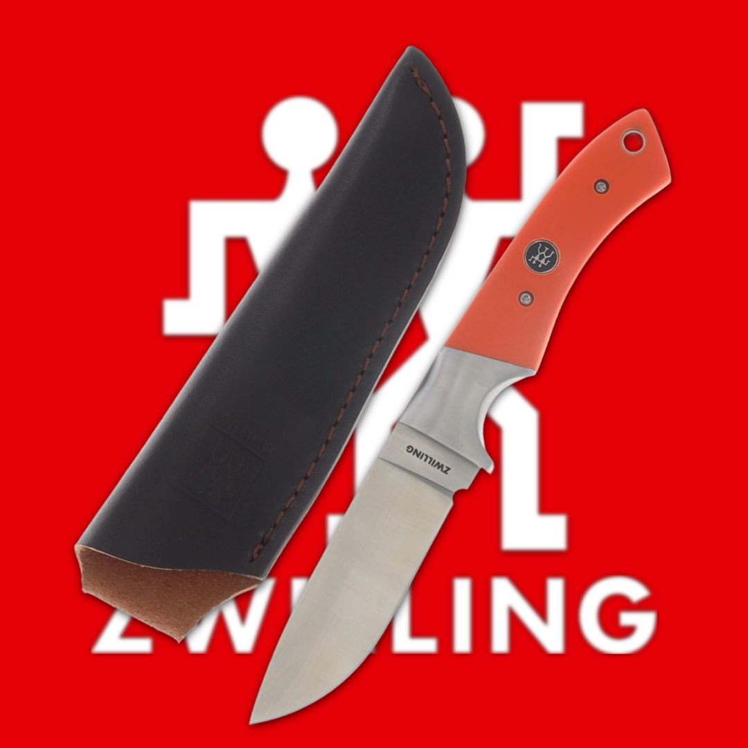 Knife with sheath against a red background featuring the Zwilling logo.