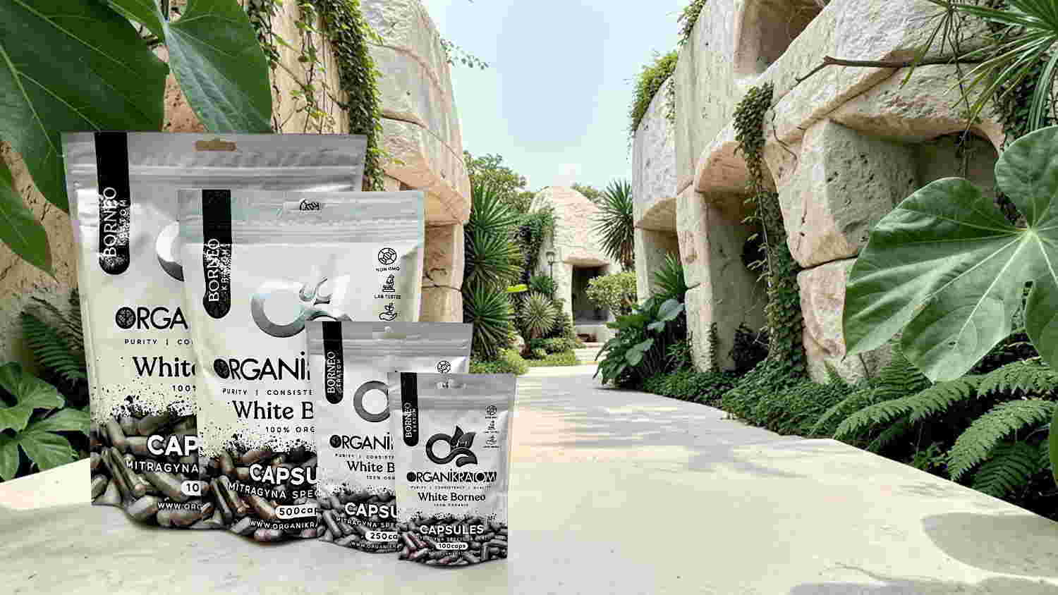 Bags of organic products displayed in a lush, green outdoor setting.