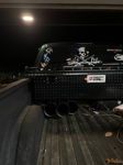 Three black train horns mounted under diamond-plate toolbox in Lukas' truck bed at night photo 3