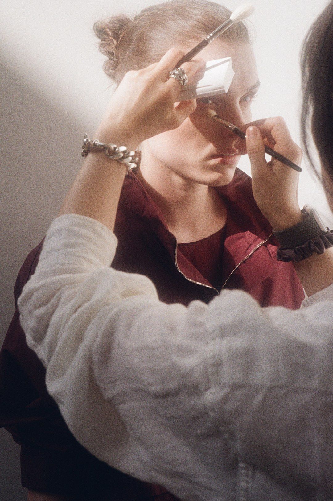 Woman getting make up done