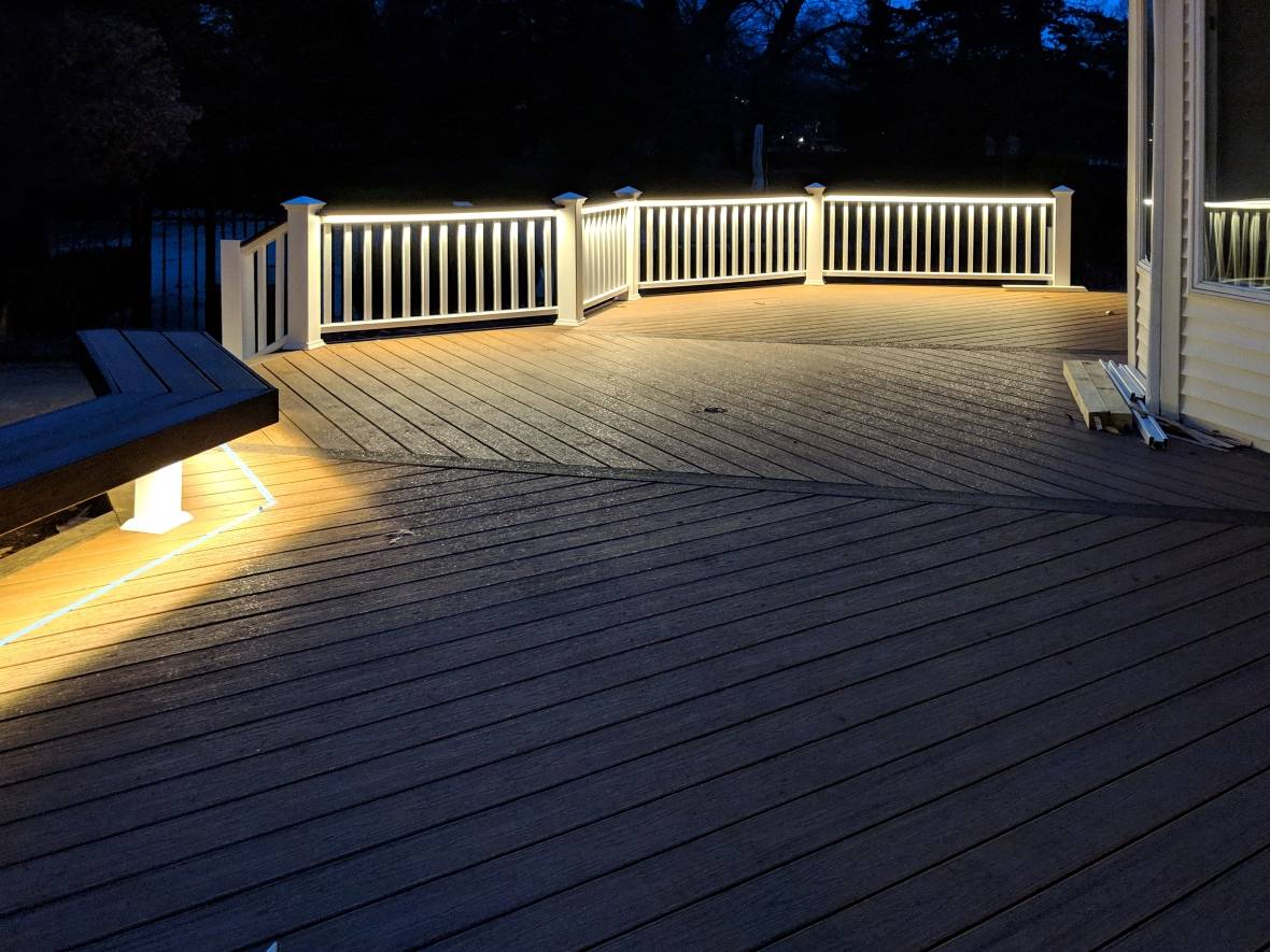Backyard deck lighting example with outdoor linear lighting