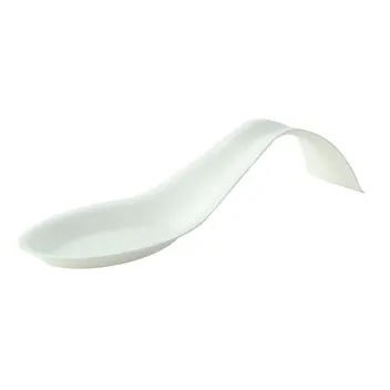 A spoon shaped white sugarcane mini dish