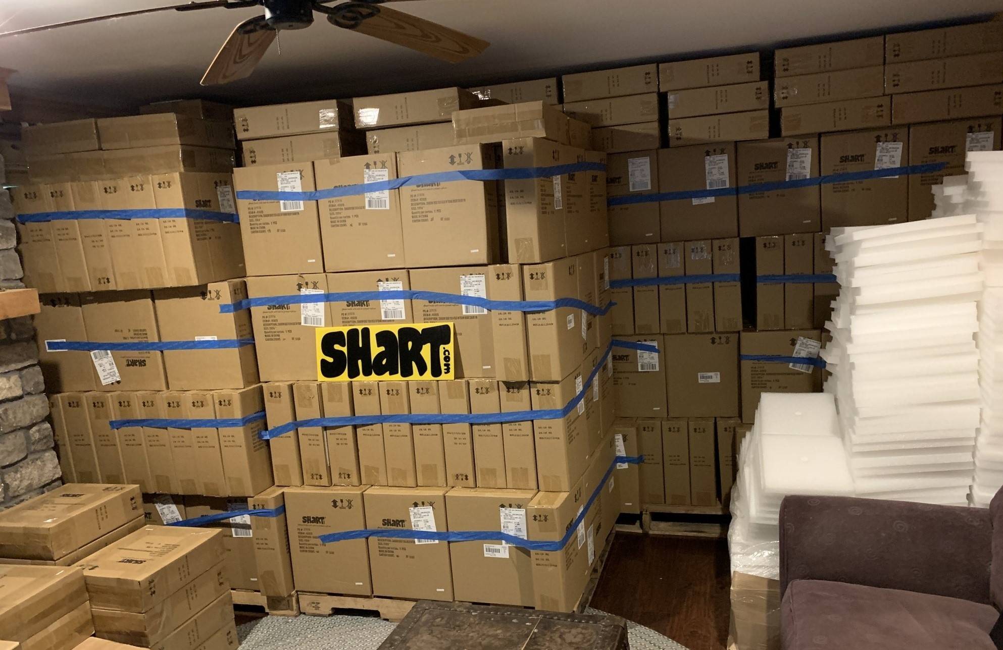The Biggest Pile of Sharts in the World - Shart Original T-Shirt Frames in the basement of Shart.com Headquarters