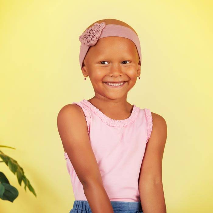 Kind mit Kopfbedeckung by Christine Headwear bei Chemotherapie