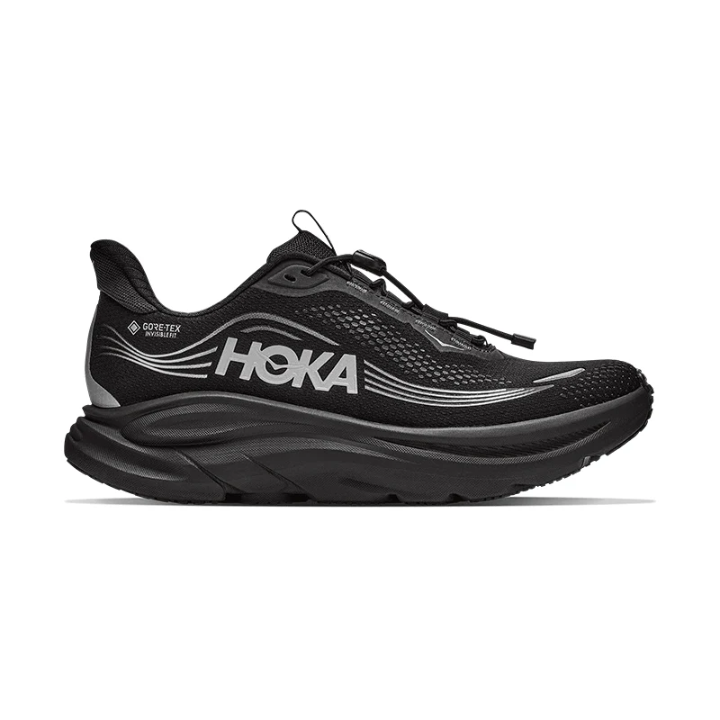 Black Hoka running shoe with mesh upper and cushioned sole.