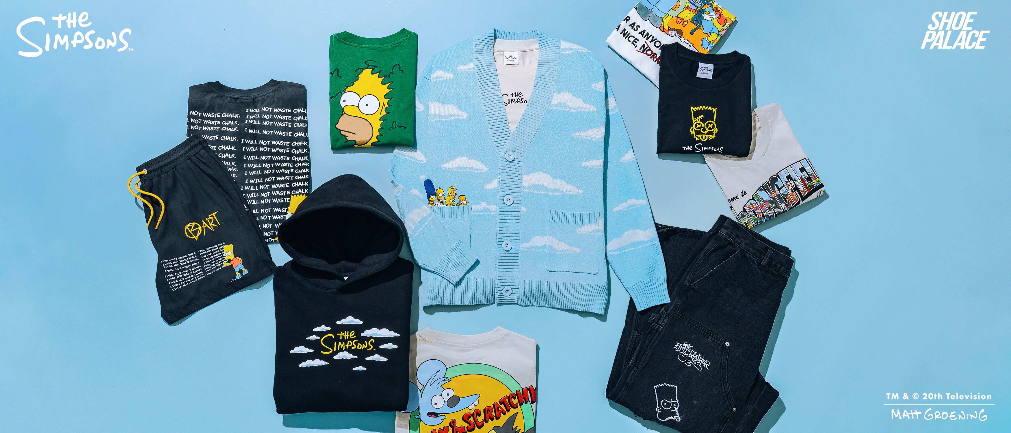 Various clothing items arranged on a blue background, featuring colorful designs.